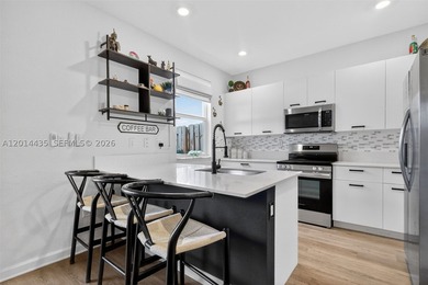 ASSUMABLE MORTGAGE OF 4.2% AVAILABLE. Welcome home to this - photo 8