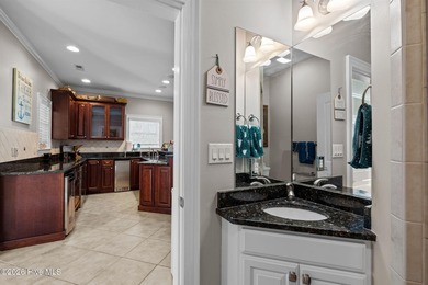 Welcome to 109 Key West Lane, a beautifully crafted custom home