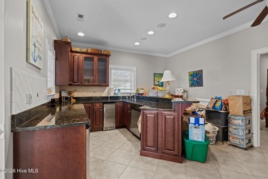 Welcome to 109 Key West Lane, a beautifully crafted custom home