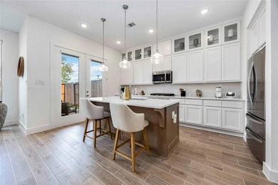 Like-new townhome featuring modern upgrades and an open - photo 17
