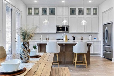 Like-new townhome featuring modern upgrades and an open - photo 18