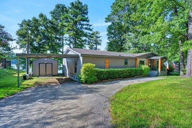 Discover the beauty of waterfront living on Lake Pinkston in - photo 3