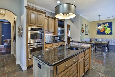 Exceptional custom stone and brick home on nearly one acre in