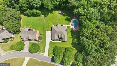 Minutes from Lake Allatoona, tucked on 3.42 private acres, this - photo 35