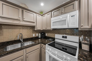 Welcome to Grand Caribbean West Unit 214, a turnkey, fully - photo 11