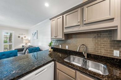 Welcome to Grand Caribbean West Unit 214, a turnkey, fully - photo 12