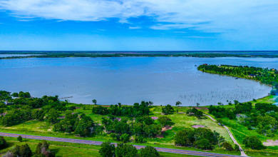 New Lake Subdivision! 1.03 acre Waterfront Lot! - photo 2