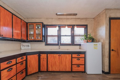 Well-kept and move-in ready! This charming home features