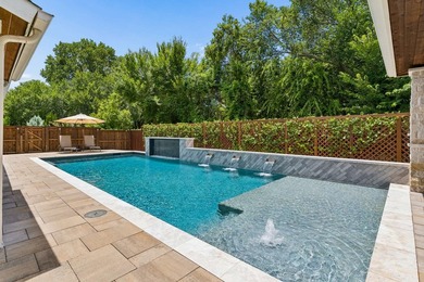 Over $600,000 in renovations have transformed this exceptional - photo 32