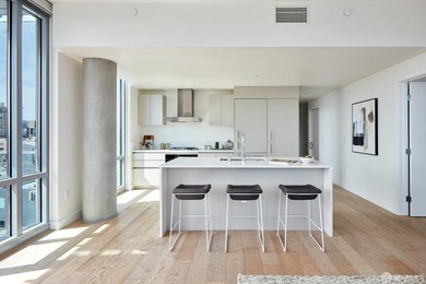 Situated on the 11th floor, this luminous two-bedroom, two-bath - photo 5