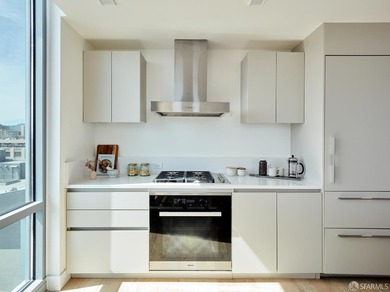 Situated on the 11th floor, this luminous two-bedroom, two-bath - photo 9