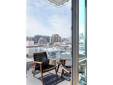 Situated on the 11th floor, this luminous two-bedroom, two-bath - photo 10