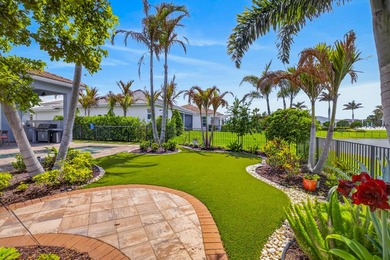 PRICE IMPROVED - GORGEOUS LANDSCAPED BACKYARD w/artificial turf - photo 2