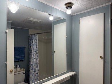 This 1974 RITZ home has 2 Bedrooms and 1.5 Baths and a bonus - photo 13