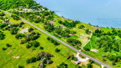 New Lake Subdivision! 1.03 acre Waterfront Lot! - photo 3