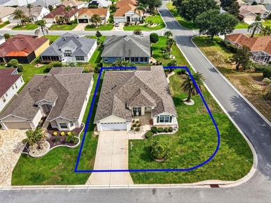 Nestled on a LARGE CORNER LOT in the highly coveted village of - photo 2