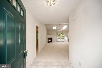 Nestled among mature green trees in the gated Lake of the Woods - photo 6
