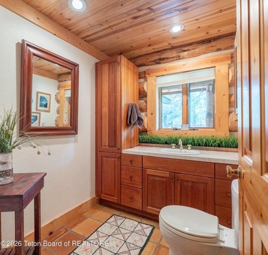 This delightful log home is set on 3.10 acres along Moose-Wilson - photo 15
