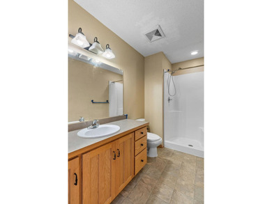 Bright, open, and overlooking the pond, this home offers a - photo 21
