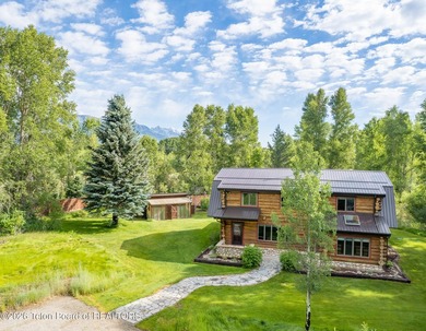 This delightful log home is set on 3.10 acres along Moose-Wilson - photo 26