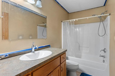 Bright, open, and overlooking the pond, this home offers a - photo 40