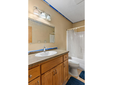 Bright, open, and overlooking the pond, this home offers a - photo 41