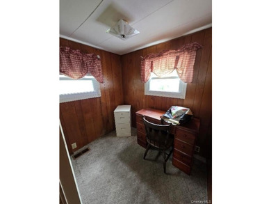 Spacious 3-bedroom, 1.5-bath mobile home filled with charm - photo 11