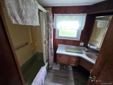 Spacious 3-bedroom, 1.5-bath mobile home filled with charm - photo 12
