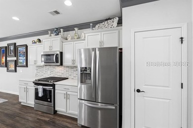 Welcome to this exceptional 4-bedroom, 2.5-bath home in the - photo 26