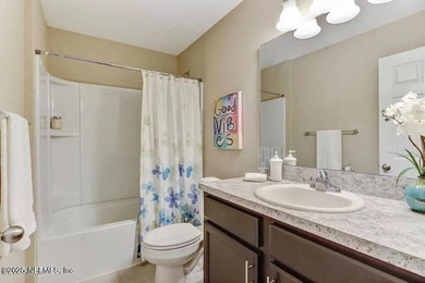 This nearly new home has 3 bedrooms and 2.5 baths with an open - photo 3