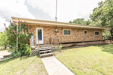 Lakefront Living on Lake Nocona! Escape to this spacious - photo 5
