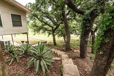 Lakefront Living on Lake Nocona! Escape to this spacious - photo 9