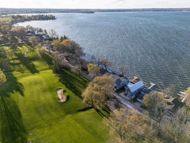 Lakefront luxury meets architectural distinction in this - photo 14