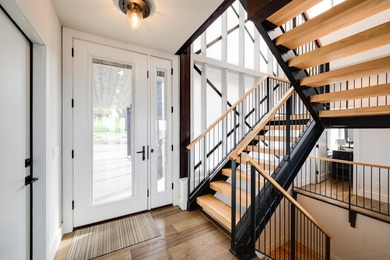 Lakefront luxury meets architectural distinction in this - photo 17