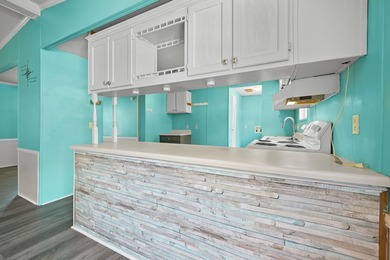 Welcome to the beach! This charming 3-bedroom, 2-bath home - photo 9