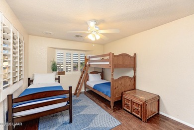 This home offers 3 bedrooms, 2 bathrooms, and a versatile - photo 23