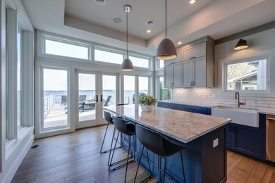 Lakefront luxury meets architectural distinction in this - photo 23