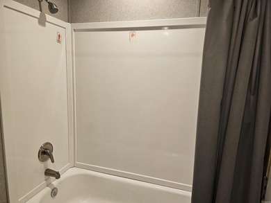 Double wide mobile home offering 5 bedrooms and 3 bathrooms on - photo 5