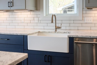 Lakefront luxury meets architectural distinction in this - photo 25
