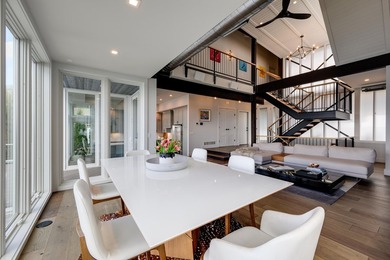 Lakefront luxury meets architectural distinction in this - photo 26