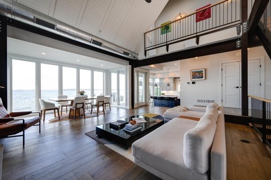 Lakefront luxury meets architectural distinction in this - photo 29