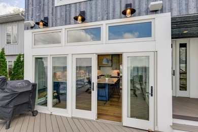 Lakefront luxury meets architectural distinction in this - photo 31