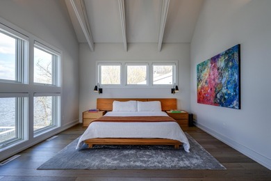 Lakefront luxury meets architectural distinction in this - photo 41