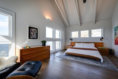 Lakefront luxury meets architectural distinction in this - photo 42
