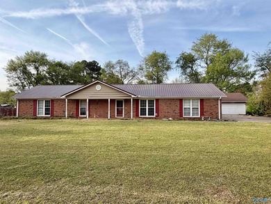 Charming 4 Bedroom, 2 Bathroom Brick Rancher on Spacious - photo 1