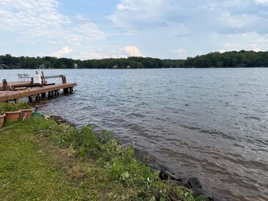 Nestled within the prestigious Lake of the Woods community, this - photo 3