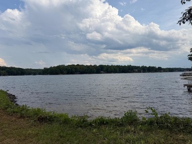 Nestled within the prestigious Lake of the Woods community, this - photo 4