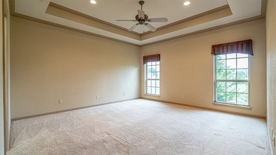 Beautifully maintained brick home with cut stone accents. Easy - photo 15