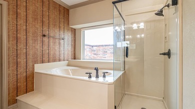 Beautifully maintained brick home with cut stone accents. Easy - photo 18