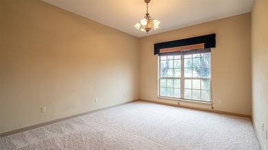 Beautifully maintained brick home with cut stone accents. Easy - photo 20